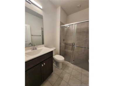 Almost new concrete home w/concrete tile roof in Jensen Beach! on Eagle Marsh Golf Club in Florida - for sale on GolfHomes.com, golf home, golf lot