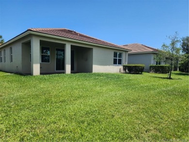 Almost new concrete home w/concrete tile roof in Jensen Beach! on Eagle Marsh Golf Club in Florida - for sale on GolfHomes.com, golf home, golf lot