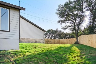 Welcome to your dream home! Nestled in a serene corner lot and on Lago Vista Golf Club in Texas - for sale on GolfHomes.com, golf home, golf lot