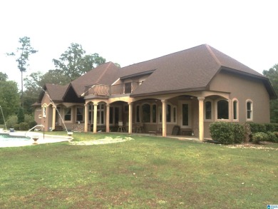 Beautiful home nestled on 13+/- acres.   Near Logan Martin Dam on Alpine Bay Resort in Alabama - for sale on GolfHomes.com, golf home, golf lot