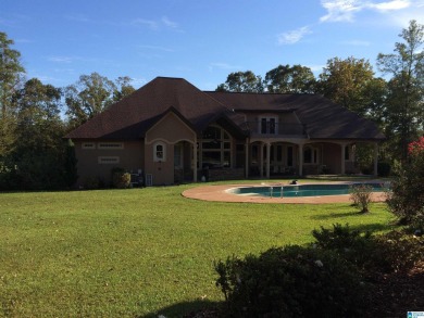 Beautiful home nestled on 13+/- acres.   Near Logan Martin Dam on Alpine Bay Resort in Alabama - for sale on GolfHomes.com, golf home, golf lot