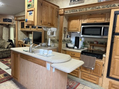 AMAZING...a beautiful corner RV lot with an immaculate 2007 on Bent Creek Golf Course in Tennessee - for sale on GolfHomes.com, golf home, golf lot