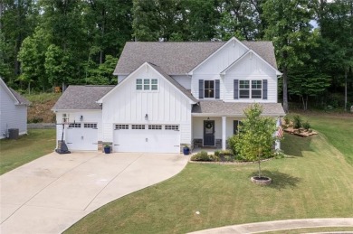 Step into modern luxury with this beautifully designed home on The Frog Golf Club in Georgia - for sale on GolfHomes.com, golf home, golf lot