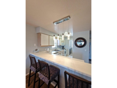 Welcome to this stunning corner unit in the highly sought-after on Pointe Royale Village Country Club in Missouri - for sale on GolfHomes.com, golf home, golf lot