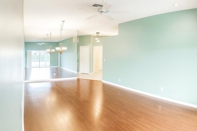 Welcome home to this vibrant 55+ 3BR/2.5BA villa with a garage on The Links At Boynton Beach - The Family Course in Florida - for sale on GolfHomes.com, golf home, golf lot