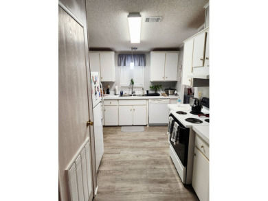 Welcome -In!!!! This meticulously maintained 2 bed /2 bath home on Spanish Lakes Fairways in Florida - for sale on GolfHomes.com, golf home, golf lot