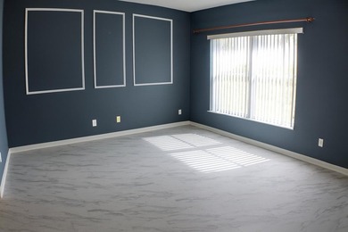 Welcome home to this vibrant 55+ 3BR/2.5BA villa with a garage on The Links At Boynton Beach - The Family Course in Florida - for sale on GolfHomes.com, golf home, golf lot