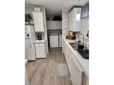 Welcome -In!!!! This meticulously maintained 2 bed /2 bath home on Spanish Lakes Fairways in Florida - for sale on GolfHomes.com, golf home, golf lot