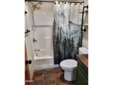 This home is immaculate! It can be used as a full time residence on Sevierville Golf Club in Tennessee - for sale on GolfHomes.com, golf home, golf lot