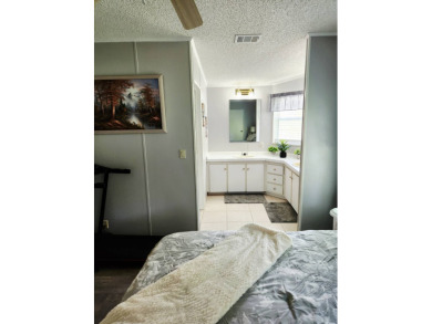 Welcome -In!!!! This meticulously maintained 2 bed /2 bath home on Spanish Lakes Fairways in Florida - for sale on GolfHomes.com, golf home, golf lot