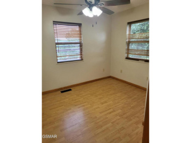 This home is immaculate! It can be used as a full time residence on Sevierville Golf Club in Tennessee - for sale on GolfHomes.com, golf home, golf lot