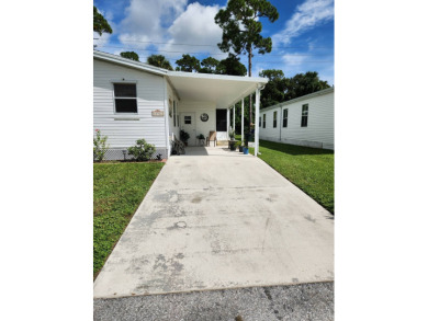 Welcome -In!!!! This meticulously maintained 2 bed /2 bath home on Spanish Lakes Fairways in Florida - for sale on GolfHomes.com, golf home, golf lot