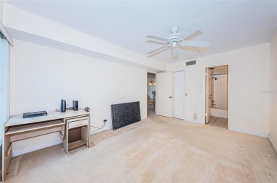 Tranquil views from this 2-bedroom 2-bathroom condo which is on Isla Del Sol Yacht and Country Club in Florida - for sale on GolfHomes.com, golf home, golf lot
