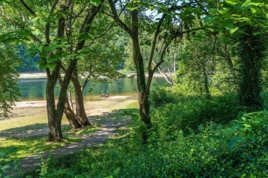 Welcome to this stunning corner unit in the highly sought-after on Pointe Royale Village Country Club in Missouri - for sale on GolfHomes.com, golf home, golf lot