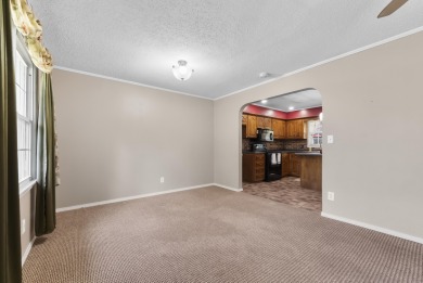 Welcome to this charming 3-bedroom, 2-bath home in one of on Horton Smith Golf Course in Missouri - for sale on GolfHomes.com, golf home, golf lot