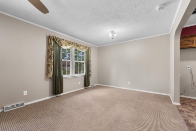 Welcome to this charming 3-bedroom, 2-bath home in one of on Horton Smith Golf Course in Missouri - for sale on GolfHomes.com, golf home, golf lot