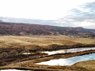 This property offers a remarkable 4.94 acres located on the 1st on Adobe Creek National Golf Course in Colorado - for sale on GolfHomes.com, golf home, golf lot