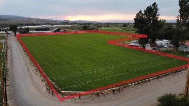 This property offers a remarkable 4.94 acres located on the 1st on Adobe Creek National Golf Course in Colorado - for sale on GolfHomes.com, golf home, golf lot