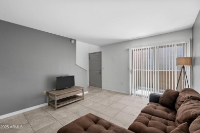 This stylish condo blends comfort and convenience with a cozy on Dobson Ranch Municipal Golf Course in Arizona - for sale on GolfHomes.com, golf home, golf lot
