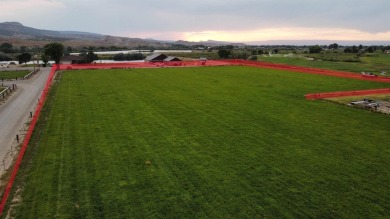 This property offers a remarkable 4.94 acres located on the 1st on Adobe Creek National Golf Course in Colorado - for sale on GolfHomes.com, golf home, golf lot