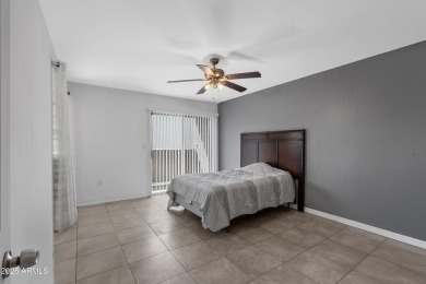 This stylish condo blends comfort and convenience with a cozy on Dobson Ranch Municipal Golf Course in Arizona - for sale on GolfHomes.com, golf home, golf lot