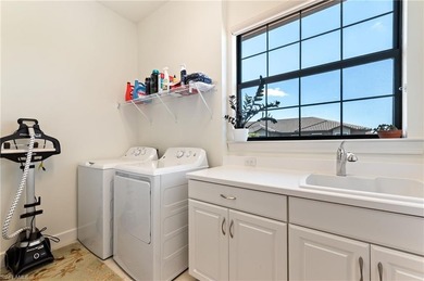 Price Reduced! Step into sophisticated coastal living in this on Esplanade Golf and  Country Club in Florida - for sale on GolfHomes.com, golf home, golf lot