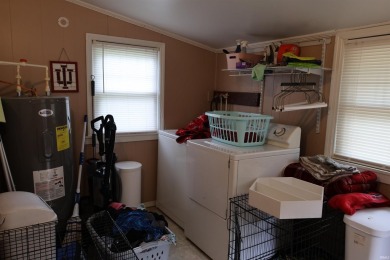 UPDATED HOME W/SPACIOUS AND PRIVATE BACKYARD. Sit on the front on French Lick Springs Golf Courses and Resort in Indiana - for sale on GolfHomes.com, golf home, golf lot