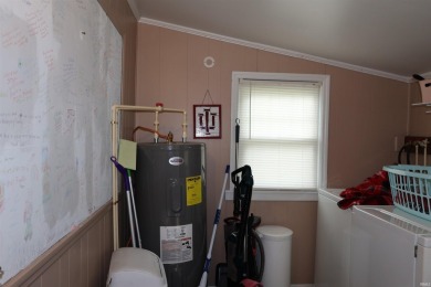 UPDATED HOME W/SPACIOUS AND PRIVATE BACKYARD. Sit on the front on French Lick Springs Golf Courses and Resort in Indiana - for sale on GolfHomes.com, golf home, golf lot