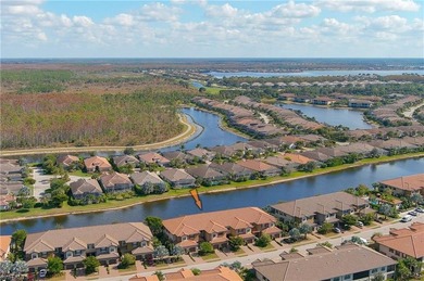 Price Reduced! Step into sophisticated coastal living in this on Esplanade Golf and  Country Club in Florida - for sale on GolfHomes.com, golf home, golf lot