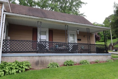 UPDATED HOME W/SPACIOUS AND PRIVATE BACKYARD. Sit on the front on French Lick Springs Golf Courses and Resort in Indiana - for sale on GolfHomes.com, golf home, golf lot