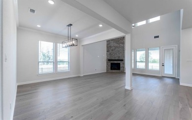 Family FRIENDLY !  The Frisco has it ALL with integrated kitchen on Heath Golf and Yacht Club in Texas - for sale on GolfHomes.com, golf home, golf lot