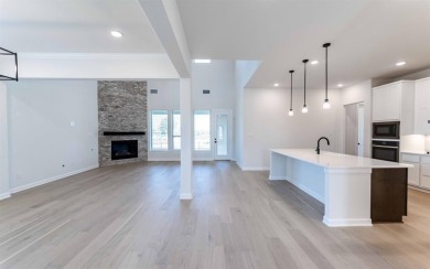 Family FRIENDLY !  The Frisco has it ALL with integrated kitchen on Heath Golf and Yacht Club in Texas - for sale on GolfHomes.com, golf home, golf lot