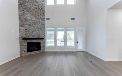 Family FRIENDLY !  The Frisco has it ALL with integrated kitchen on Heath Golf and Yacht Club in Texas - for sale on GolfHomes.com, golf home, golf lot