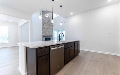 Family FRIENDLY !  The Frisco has it ALL with integrated kitchen on Heath Golf and Yacht Club in Texas - for sale on GolfHomes.com, golf home, golf lot