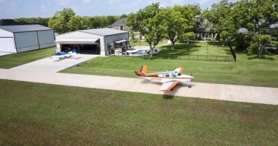 Discover the perfect blend of country living and community on Pecan Plantation Country Club in Texas - for sale on GolfHomes.com, golf home, golf lot