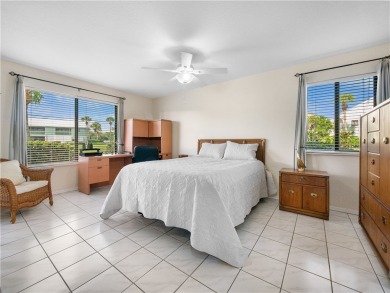 First floor unit with a lake view. 42* kitchen cabinets, granite on Pelican Pointe 9 Hole Course in Florida - for sale on GolfHomes.com, golf home, golf lot