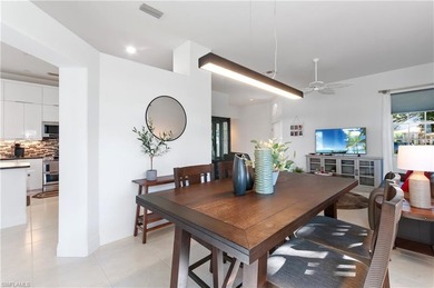 EXQUISITE TURNKEY GOLF-FRONT RESIDENCE IN WORTHINGTON COUNTRY on Worthington Country Club in Florida - for sale on GolfHomes.com, golf home, golf lot