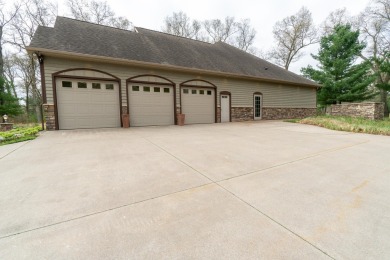 Welcome to your dream home on the prestigious #12 green at on Stonegate Golf Club in Michigan - for sale on GolfHomes.com, golf home, golf lot