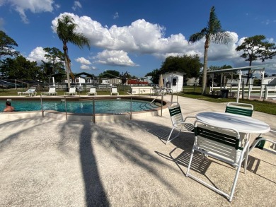 Discover the perfect blend of comfort and active living in this on Indianwood Golf and Country Club in Florida - for sale on GolfHomes.com, golf home, golf lot