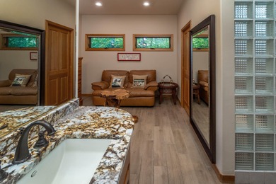 Nestled on a quiet cul-de-sac along the 18th fairway, this on Awbrey Glen Golf Club in Oregon - for sale on GolfHomes.com, golf home, golf lot