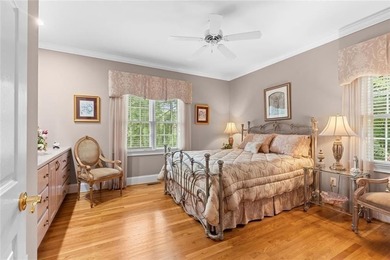 This exquisite four-sided blush brick estate is the epitome of on Royal Lakes Golf and Country Club in Georgia - for sale on GolfHomes.com, golf home, golf lot