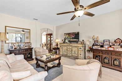 Welcome to a life that feels like vacation every day. Nestled in on Arlington Ridge Golf Club in Florida - for sale on GolfHomes.com, golf home, golf lot