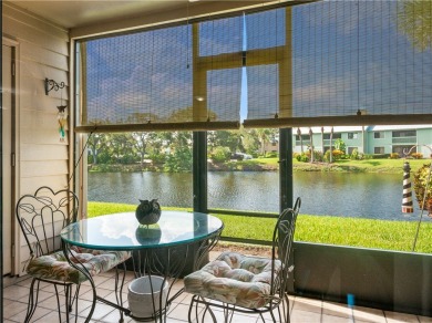 First floor unit with a lake view. 42* kitchen cabinets, granite on Pelican Pointe 9 Hole Course in Florida - for sale on GolfHomes.com, golf home, golf lot