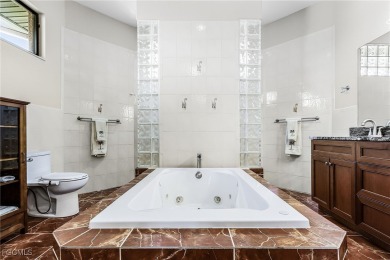 Welcome to this one-of-a-kind, spacious 4-bedroom, 2-large-den on Royal Tee Country Club in Florida - for sale on GolfHomes.com, golf home, golf lot