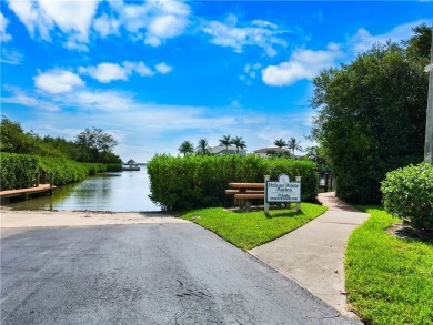 First floor unit with a lake view. 42* kitchen cabinets, granite on Pelican Pointe 9 Hole Course in Florida - for sale on GolfHomes.com, golf home, golf lot