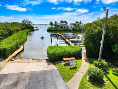 First floor unit with a lake view. 42* kitchen cabinets, granite on Pelican Pointe 9 Hole Course in Florida - for sale on GolfHomes.com, golf home, golf lot