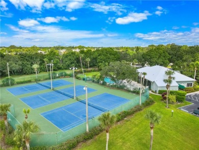 First floor unit with a lake view. 42* kitchen cabinets, granite on Pelican Pointe 9 Hole Course in Florida - for sale on GolfHomes.com, golf home, golf lot