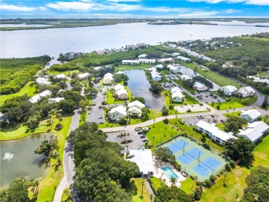 First floor unit with a lake view. 42* kitchen cabinets, granite on Pelican Pointe 9 Hole Course in Florida - for sale on GolfHomes.com, golf home, golf lot