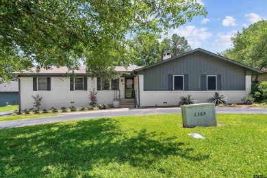 Located in the desirable Hideaway Lake Community, this charming on Hide-A-Way Lake Golf Course in Texas - for sale on GolfHomes.com, golf home, golf lot
