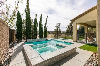 Experience luxury living in guard-gated Club Aliante! This on Aliante Golf Club in Nevada - for sale on GolfHomes.com, golf home, golf lot